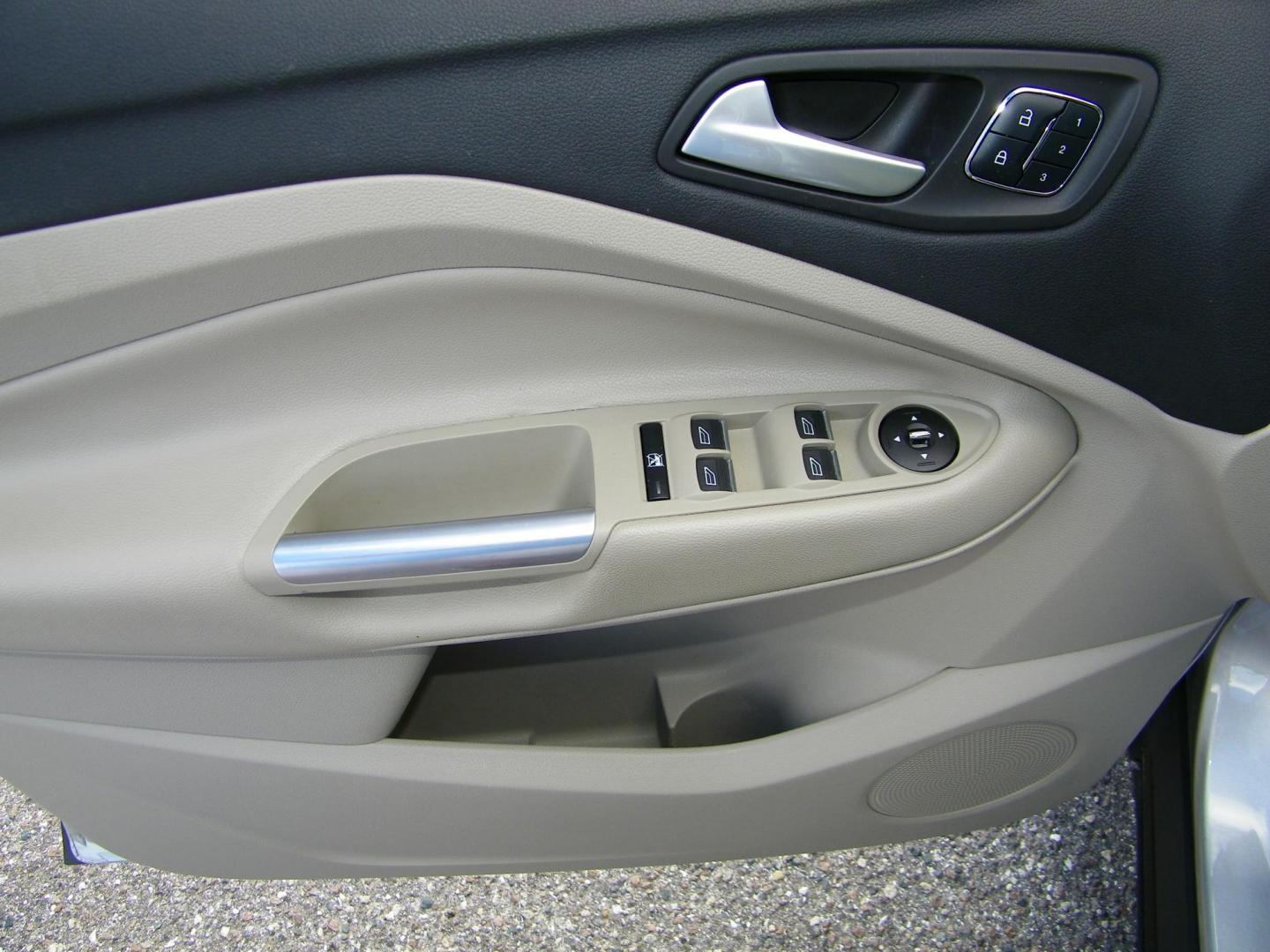 2016 Silver /Beige Ford Escape Titanium FWD (1FMCU0J95GU) with an 2.0L L4 DOHC 16V engine, 6-Speed Automatic transmission, located at 4000 Bee Ridge Road, Sarasota, FL, 34233, (941) 926-0300, 27.298664, -82.489151 - Photo#18