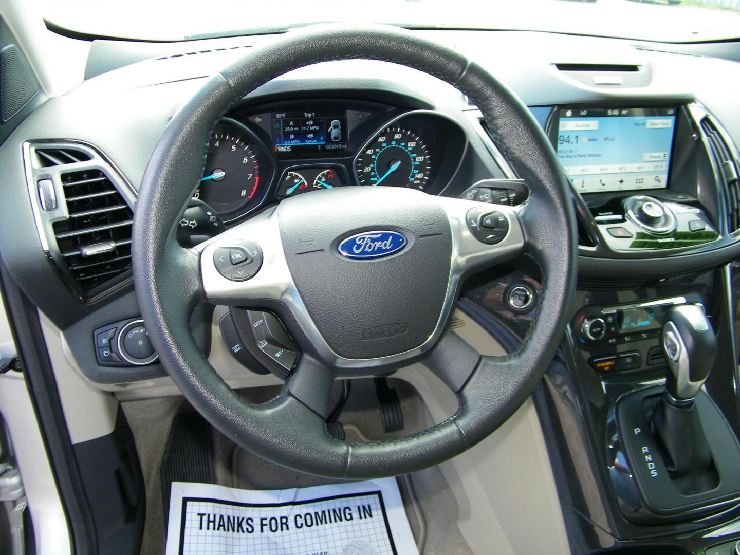 2016 Silver /Beige Ford Escape Titanium FWD (1FMCU0J95GU) with an 2.0L L4 DOHC 16V engine, 6-Speed Automatic transmission, located at 4000 Bee Ridge Road, Sarasota, FL, 34233, (941) 926-0300, 27.298664, -82.489151 - Photo#21