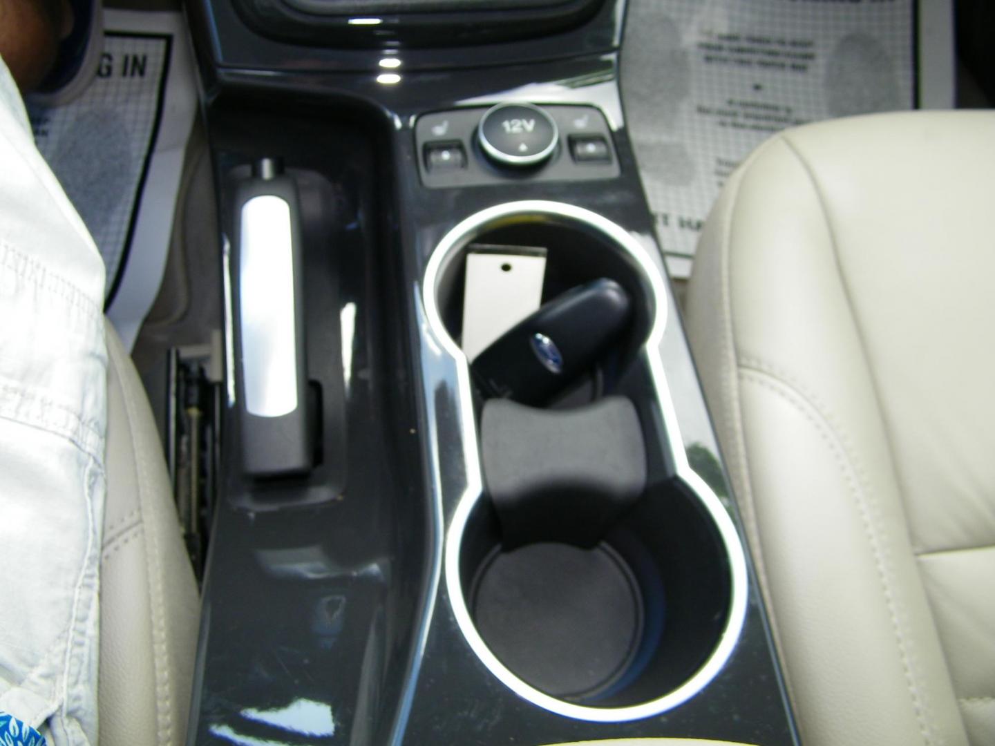 2016 Silver /Beige Ford Escape Titanium FWD (1FMCU0J95GU) with an 2.0L L4 DOHC 16V engine, 6-Speed Automatic transmission, located at 4000 Bee Ridge Road, Sarasota, FL, 34233, (941) 926-0300, 27.298664, -82.489151 - Photo#22