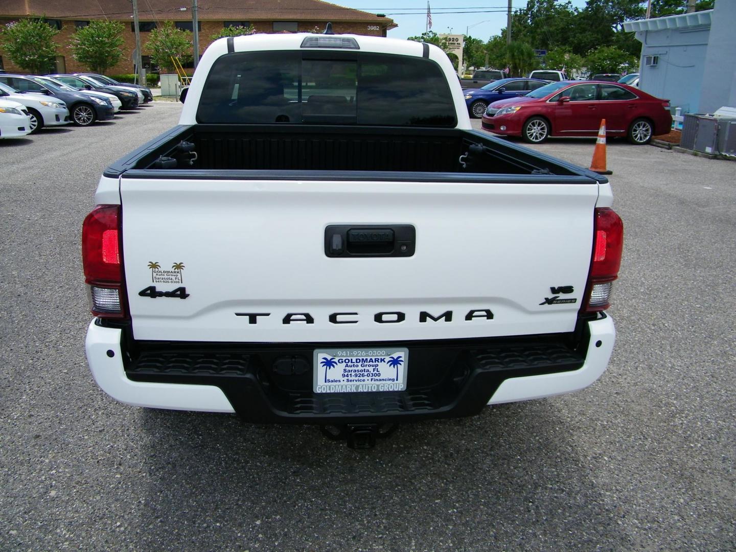 2023 White /Black Toyota Tacoma SR5 Double Cab Long Bed V6 6AT 4WD (3TYCZ5AN3PT) with an 3.5L V6 DOHC 24V engine, 6A transmission, located at 4000 Bee Ridge Road, Sarasota, FL, 34233, (941) 926-0300, 27.298664, -82.489151 - Photo#4