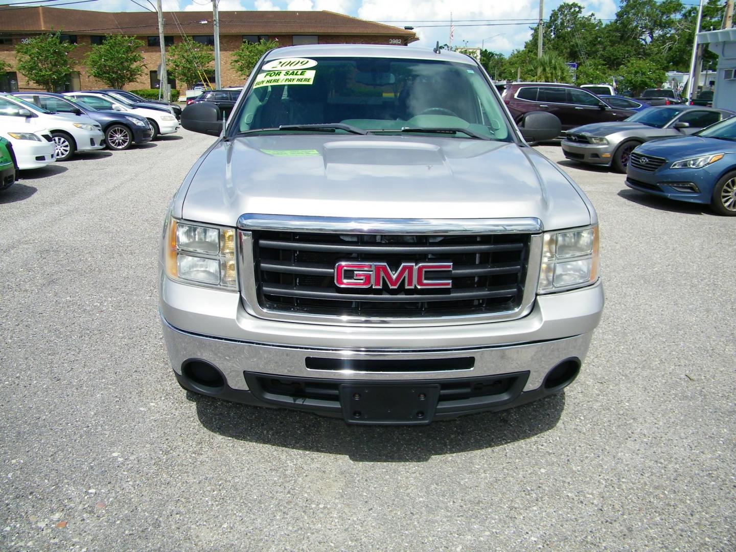 2009 Gold /Black GMC Sierra 1500 Work Truck Ext. Cab Long Box 2WD (2GTEC19C691) with an 4.8L V8 OHV 16V engine, 4-Speed Automatic transmission, located at 4000 Bee Ridge Road, Sarasota, FL, 34233, (941) 926-0300, 27.298664, -82.489151 - Photo#1