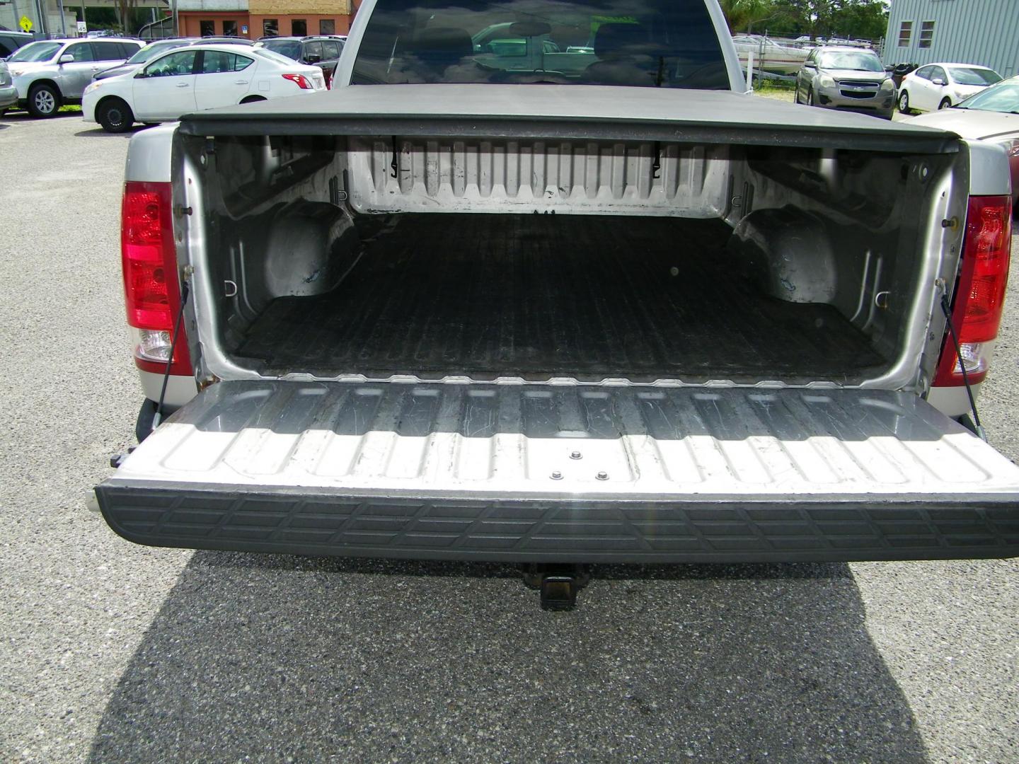 2009 Gold /Black GMC Sierra 1500 Work Truck Ext. Cab Long Box 2WD (2GTEC19C691) with an 4.8L V8 OHV 16V engine, 4-Speed Automatic transmission, located at 4000 Bee Ridge Road, Sarasota, FL, 34233, (941) 926-0300, 27.298664, -82.489151 - Photo#6