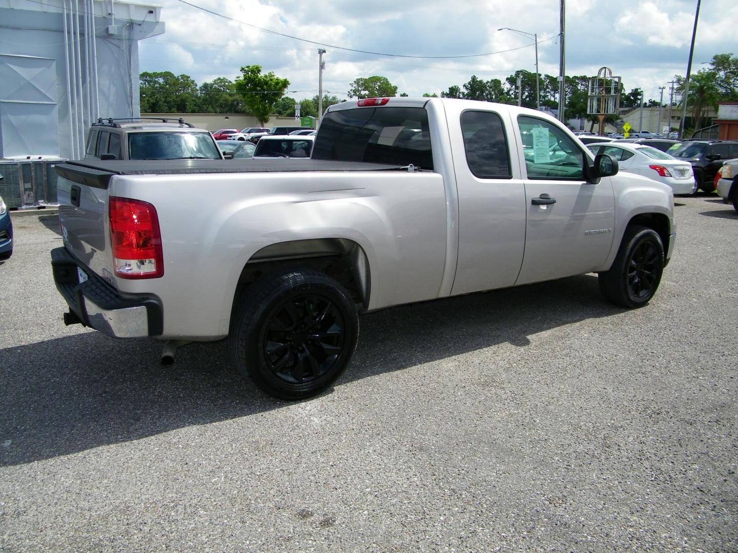 2009 Gold /Black GMC Sierra 1500 Work Truck Ext. Cab Long Box 2WD (2GTEC19C691) with an 4.8L V8 OHV 16V engine, 4-Speed Automatic transmission, located at 4000 Bee Ridge Road, Sarasota, FL, 34233, (941) 926-0300, 27.298664, -82.489151 - Photo#7