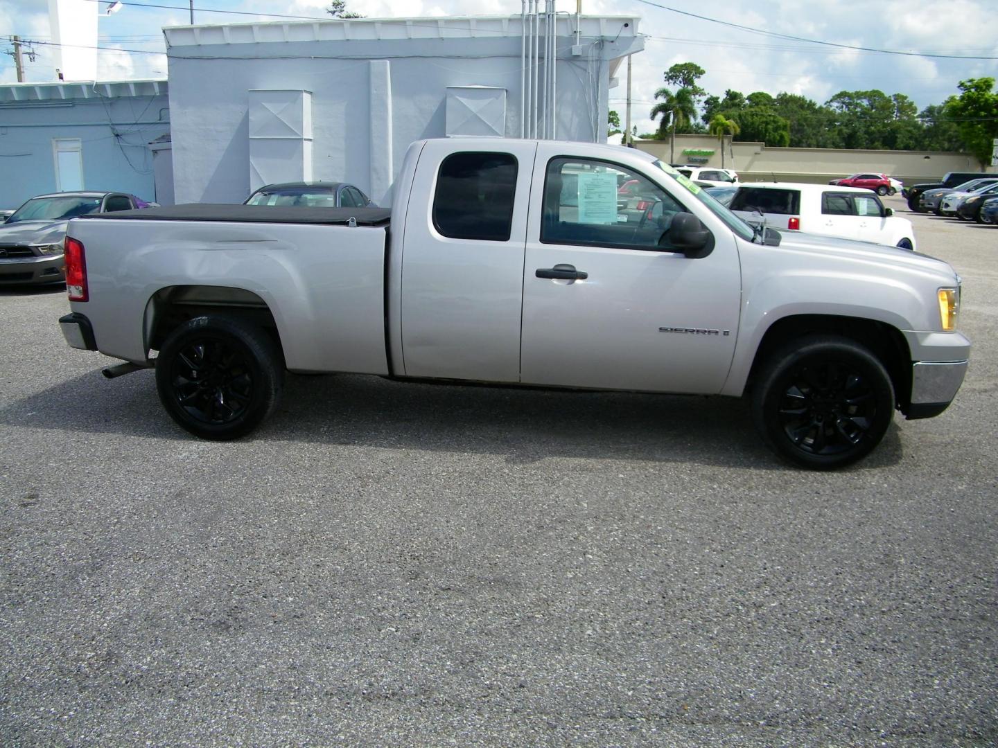 2009 Gold /Black GMC Sierra 1500 Work Truck Ext. Cab Long Box 2WD (2GTEC19C691) with an 4.8L V8 OHV 16V engine, 4-Speed Automatic transmission, located at 4000 Bee Ridge Road, Sarasota, FL, 34233, (941) 926-0300, 27.298664, -82.489151 - Photo#8