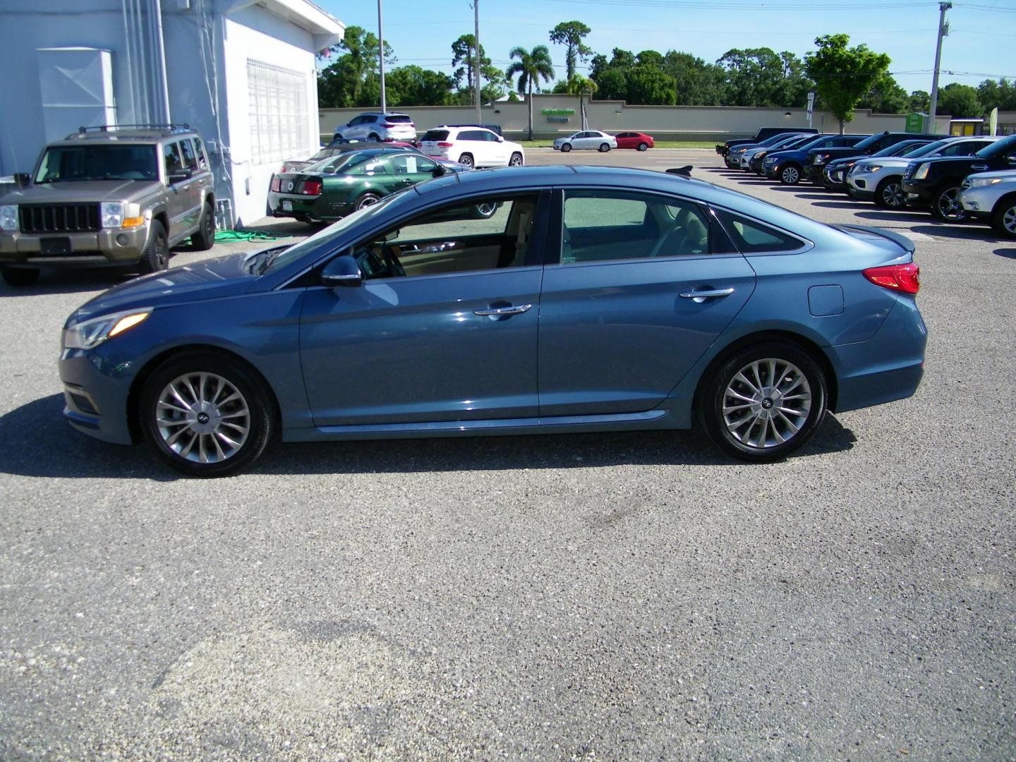 2015 Blue /Beige Hyundai Sonata Sport (5NPE34AF0FH) with an 2.4L L4 DOHC 16V engine, 6-Speed Automatic transmission, located at 4000 Bee Ridge Road, Sarasota, FL, 34233, (941) 926-0300, 27.298664, -82.489151 - Photo#2