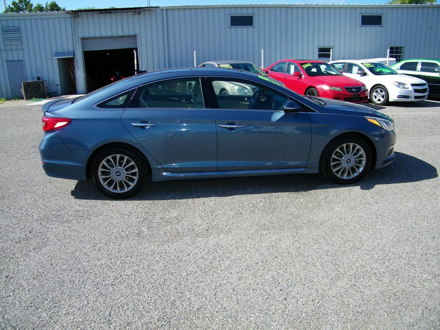 2015 Blue /Beige Hyundai Sonata Sport (5NPE34AF0FH) with an 2.4L L4 DOHC 16V engine, 6-Speed Automatic transmission, located at 4000 Bee Ridge Road, Sarasota, FL, 34233, (941) 926-0300, 27.298664, -82.489151 - Photo#6