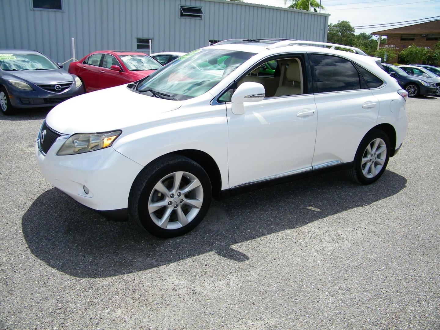 2011 White /Tan Lexus RX 350 FWD (JTJZK1BA4B2) with an 3.5L V6 DOHC 24V engine, 5-Speed Automatic transmission, located at 4000 Bee Ridge Road, Sarasota, FL, 34233, (941) 926-0300, 27.298664, -82.489151 - Photo#0
