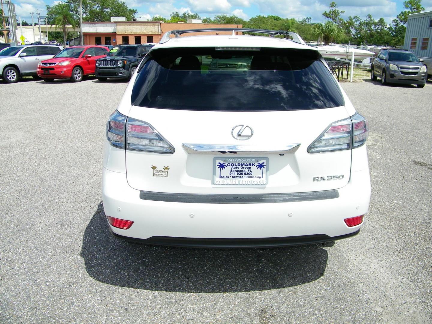 2011 White /Tan Lexus RX 350 FWD (JTJZK1BA4B2) with an 3.5L V6 DOHC 24V engine, 5-Speed Automatic transmission, located at 4000 Bee Ridge Road, Sarasota, FL, 34233, (941) 926-0300, 27.298664, -82.489151 - Photo#4