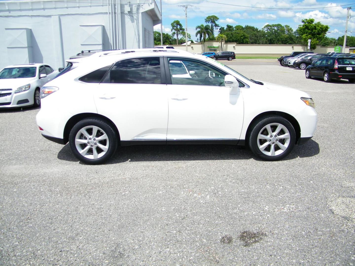 2011 White /Tan Lexus RX 350 FWD (JTJZK1BA4B2) with an 3.5L V6 DOHC 24V engine, 5-Speed Automatic transmission, located at 4000 Bee Ridge Road, Sarasota, FL, 34233, (941) 926-0300, 27.298664, -82.489151 - Photo#6