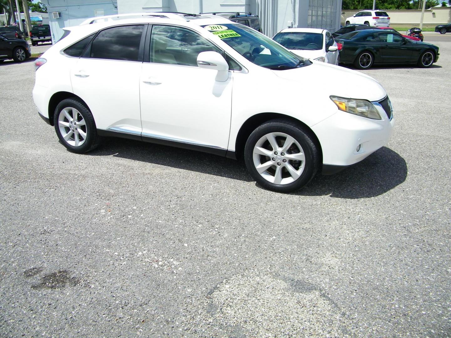 2011 White /Tan Lexus RX 350 FWD (JTJZK1BA4B2) with an 3.5L V6 DOHC 24V engine, 5-Speed Automatic transmission, located at 4000 Bee Ridge Road, Sarasota, FL, 34233, (941) 926-0300, 27.298664, -82.489151 - Photo#7