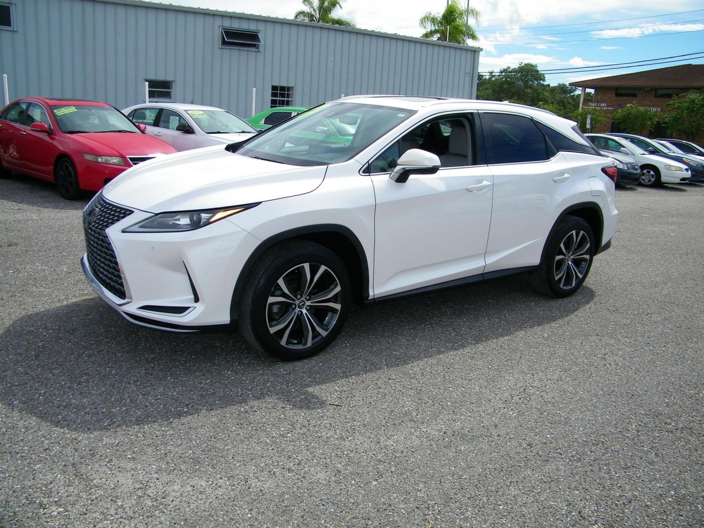 2021 White /Tan Lexus RX 350 FWD (2T2HZMAA8MC) with an 3.5L V6 DOHC 24V engine, 6A transmission, located at 4000 Bee Ridge Road, Sarasota, FL, 34233, (941) 926-0300, 27.298664, -82.489151 - Photo#0