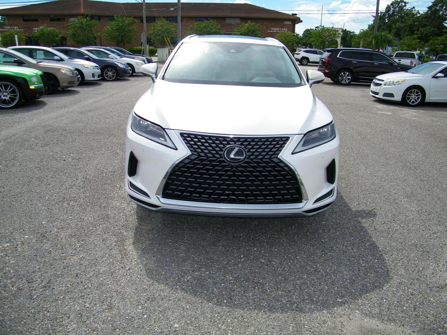 2021 White /Tan Lexus RX 350 FWD (2T2HZMAA8MC) with an 3.5L V6 DOHC 24V engine, 6A transmission, located at 4000 Bee Ridge Road, Sarasota, FL, 34233, (941) 926-0300, 27.298664, -82.489151 - Photo#1