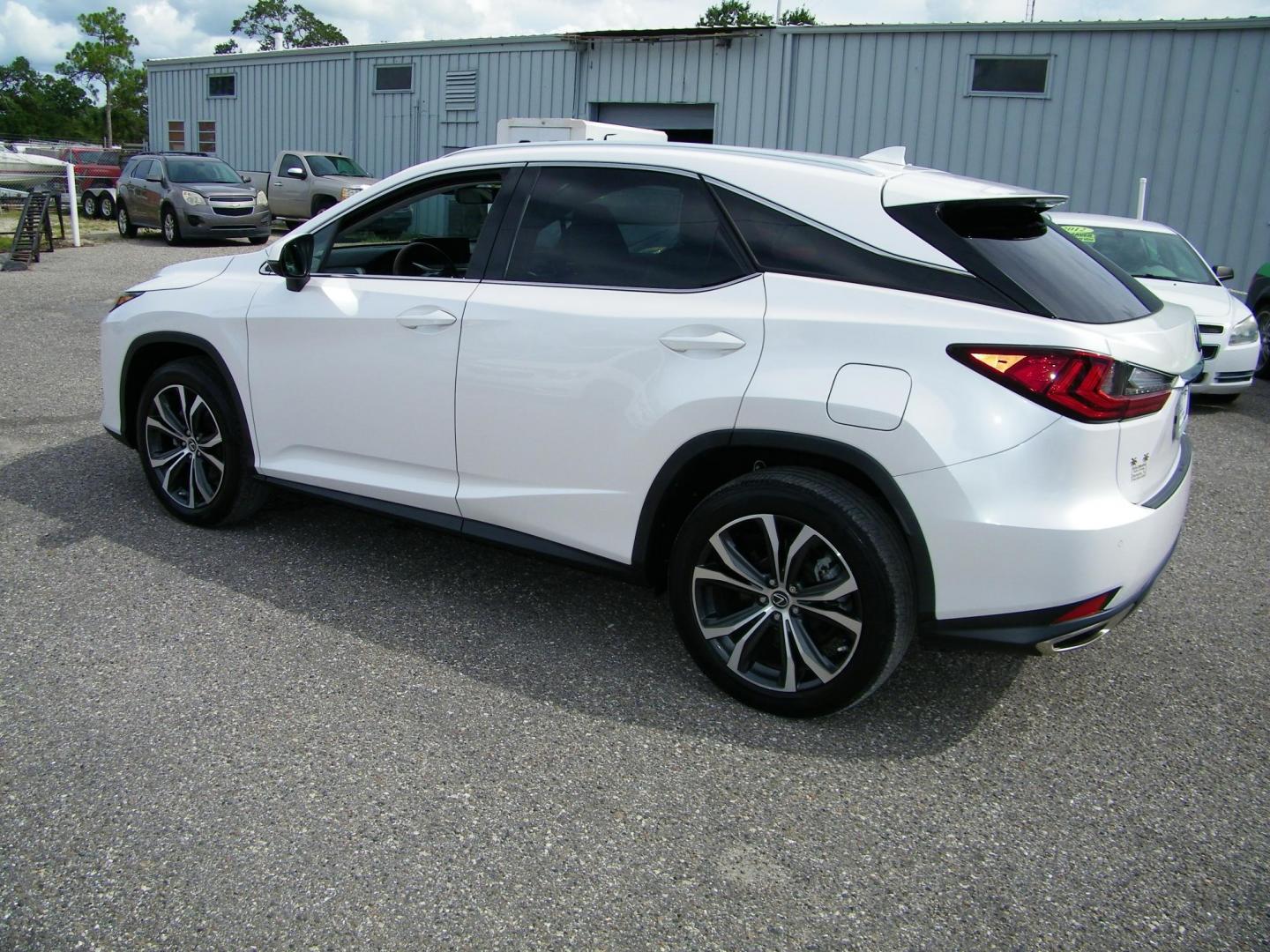 2021 White /Tan Lexus RX 350 FWD (2T2HZMAA8MC) with an 3.5L V6 DOHC 24V engine, 6A transmission, located at 4000 Bee Ridge Road, Sarasota, FL, 34233, (941) 926-0300, 27.298664, -82.489151 - Photo#3