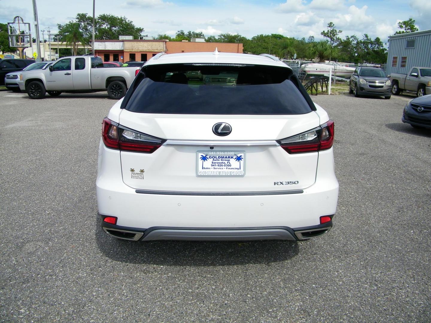 2021 White /Tan Lexus RX 350 FWD (2T2HZMAA8MC) with an 3.5L V6 DOHC 24V engine, 6A transmission, located at 4000 Bee Ridge Road, Sarasota, FL, 34233, (941) 926-0300, 27.298664, -82.489151 - Photo#4
