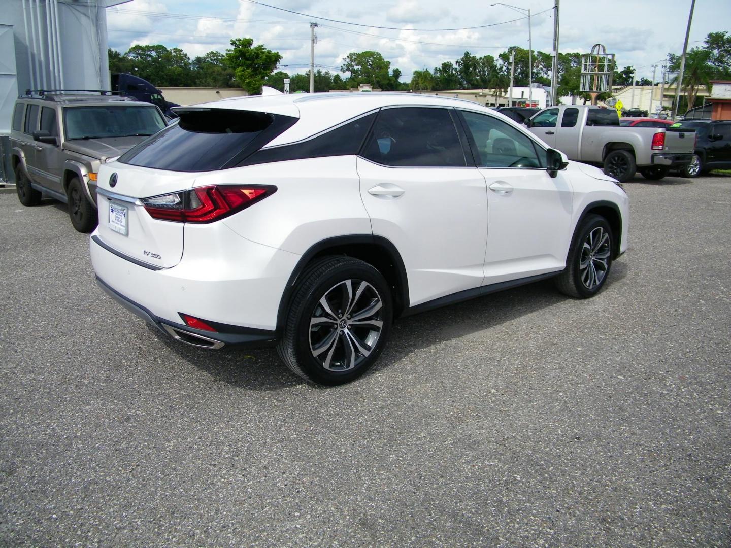 2021 White /Tan Lexus RX 350 FWD (2T2HZMAA8MC) with an 3.5L V6 DOHC 24V engine, 6A transmission, located at 4000 Bee Ridge Road, Sarasota, FL, 34233, (941) 926-0300, 27.298664, -82.489151 - Photo#5