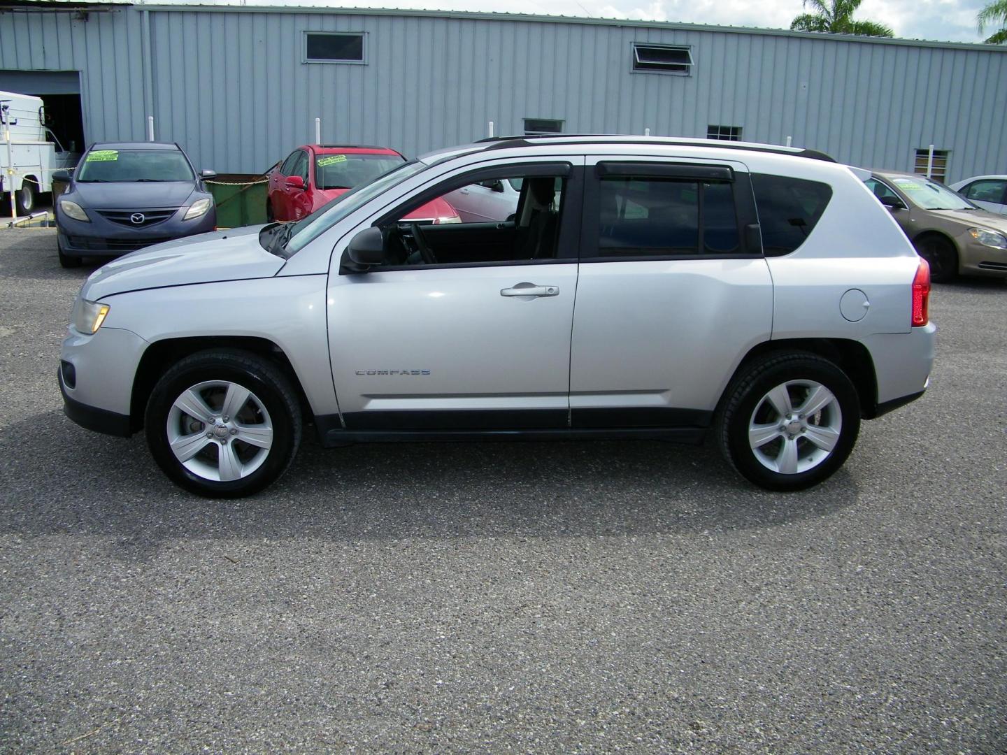 2012 Silver /Gray Jeep Compass Sport FWD (1C4NJCBB2CD) with an 2.4L L4 DOHC 16V engine, Automatic transmission, located at 4000 Bee Ridge Road, Sarasota, FL, 34233, (941) 926-0300, 27.298664, -82.489151 - Photo#2
