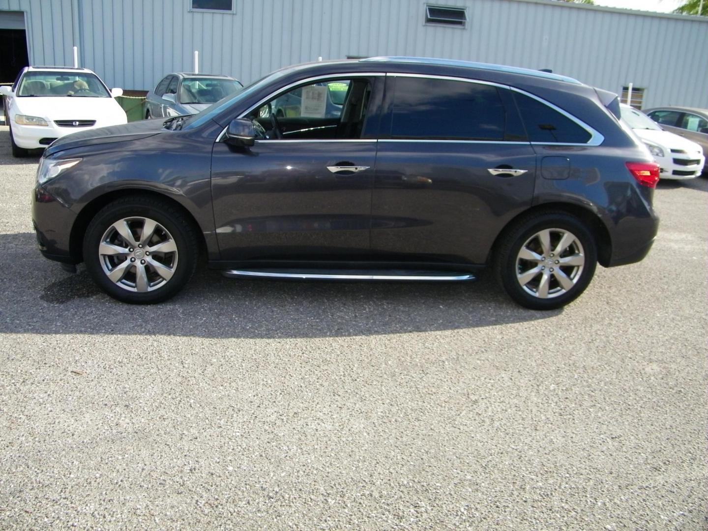 2016 Gray /Beige Acura MDX 9-Spd AT SH-AWD w/Advance Package (5FRYD4H95GB) with an 3.5L V6 SOHC 24V engine, 9-Speed Automatic transmission, located at 4000 Bee Ridge Road, Sarasota, FL, 34233, (941) 926-0300, 27.298664, -82.489151 - Photo#2