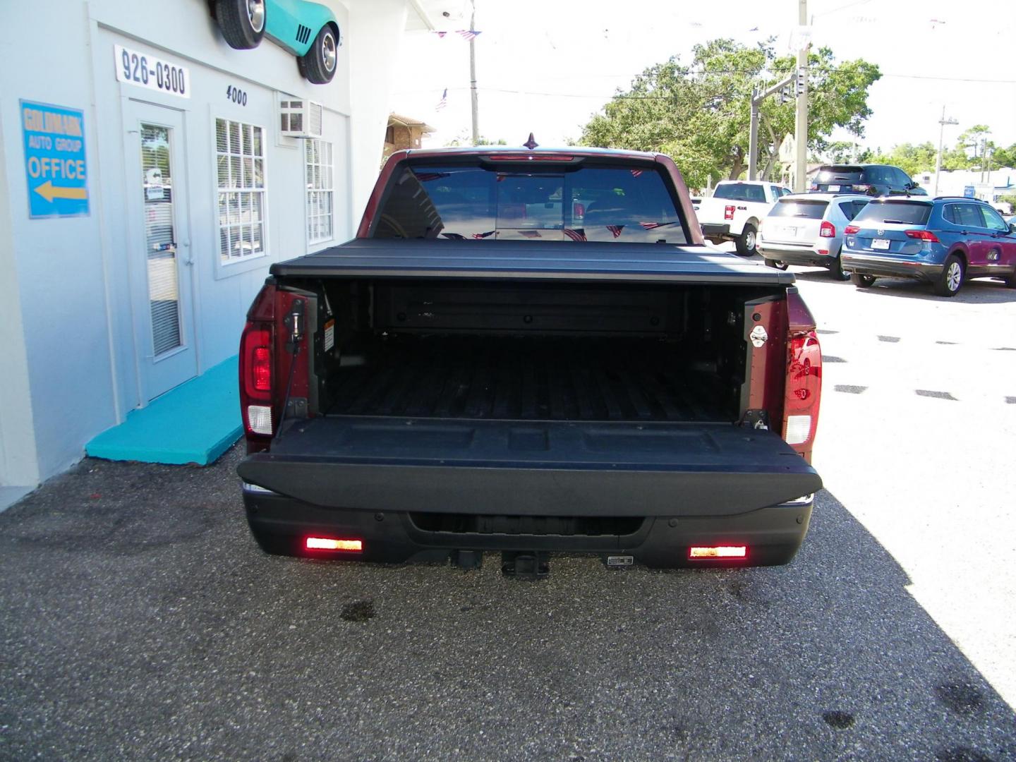 2020 Maroon /Beige Honda Ridgeline RTL-E AWD (5FPYK3F70LB) with an 3.5L V6 SOHC 24V engine, 6A transmission, located at 4000 Bee Ridge Road, Sarasota, FL, 34233, (941) 926-0300, 27.298664, -82.489151 - Photo#7