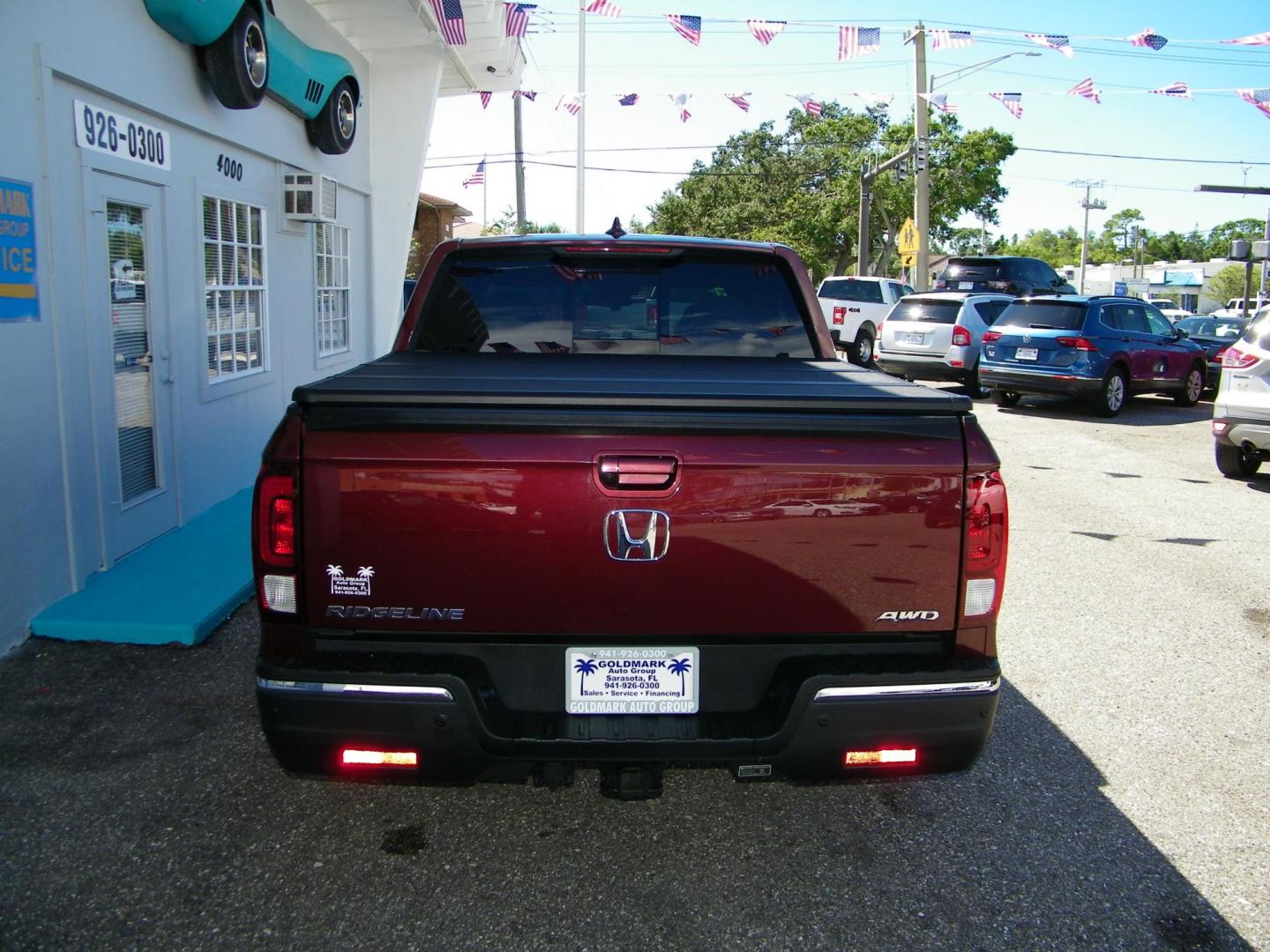 2020 Maroon /Beige Honda Ridgeline RTL-E AWD (5FPYK3F70LB) with an 3.5L V6 SOHC 24V engine, 6A transmission, located at 4000 Bee Ridge Road, Sarasota, FL, 34233, (941) 926-0300, 27.298664, -82.489151 - Photo#6