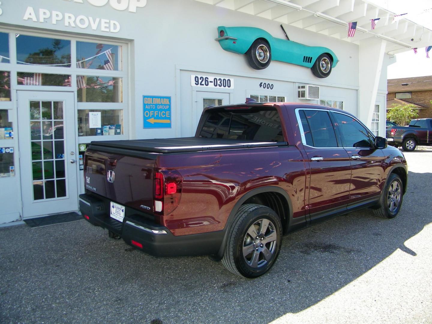 2020 Maroon /Beige Honda Ridgeline RTL-E AWD (5FPYK3F70LB) with an 3.5L V6 SOHC 24V engine, 6A transmission, located at 4000 Bee Ridge Road, Sarasota, FL, 34233, (941) 926-0300, 27.298664, -82.489151 - Photo#4
