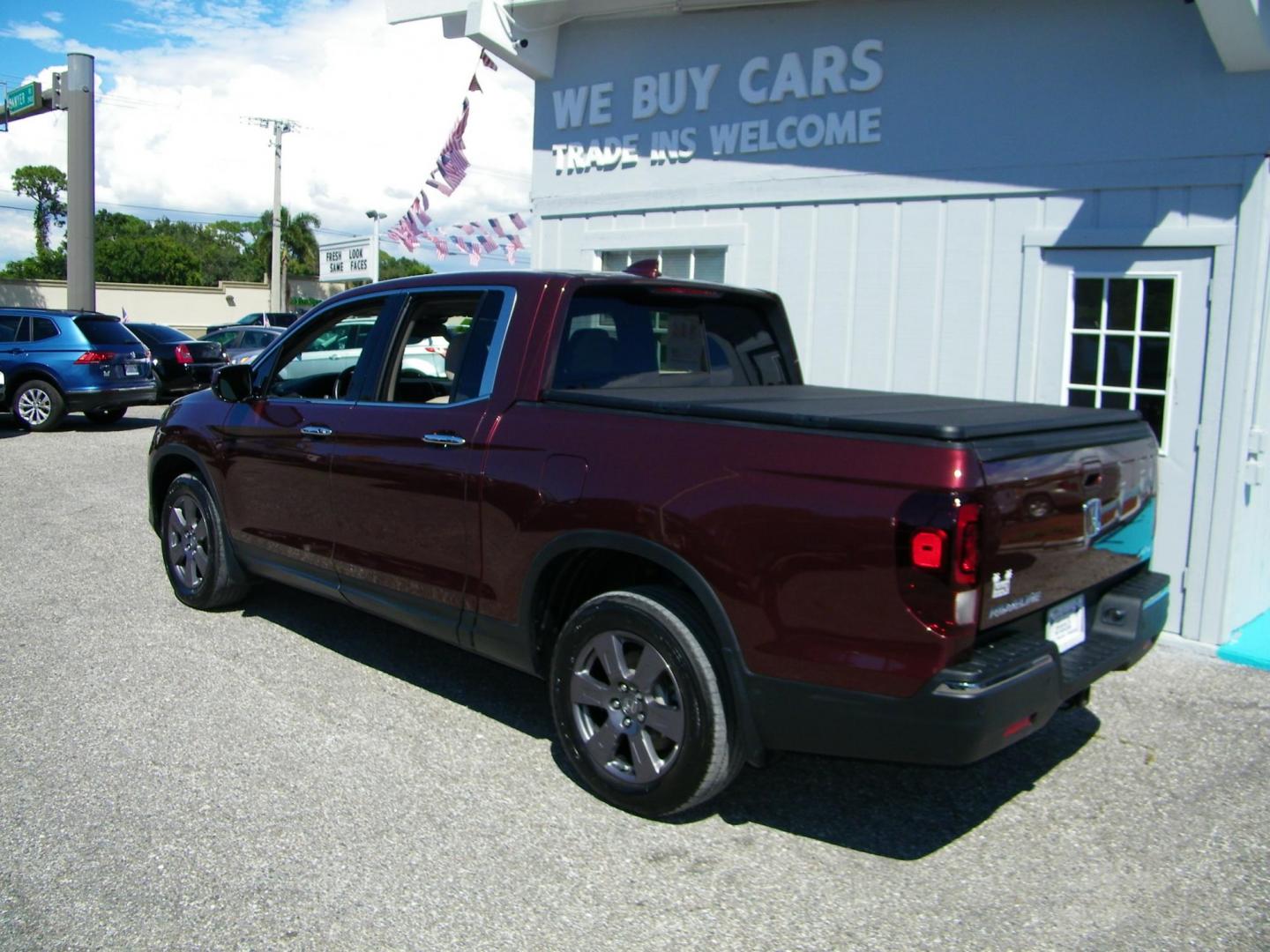2020 Maroon /Beige Honda Ridgeline RTL-E AWD (5FPYK3F70LB) with an 3.5L V6 SOHC 24V engine, 6A transmission, located at 4000 Bee Ridge Road, Sarasota, FL, 34233, (941) 926-0300, 27.298664, -82.489151 - Photo#2