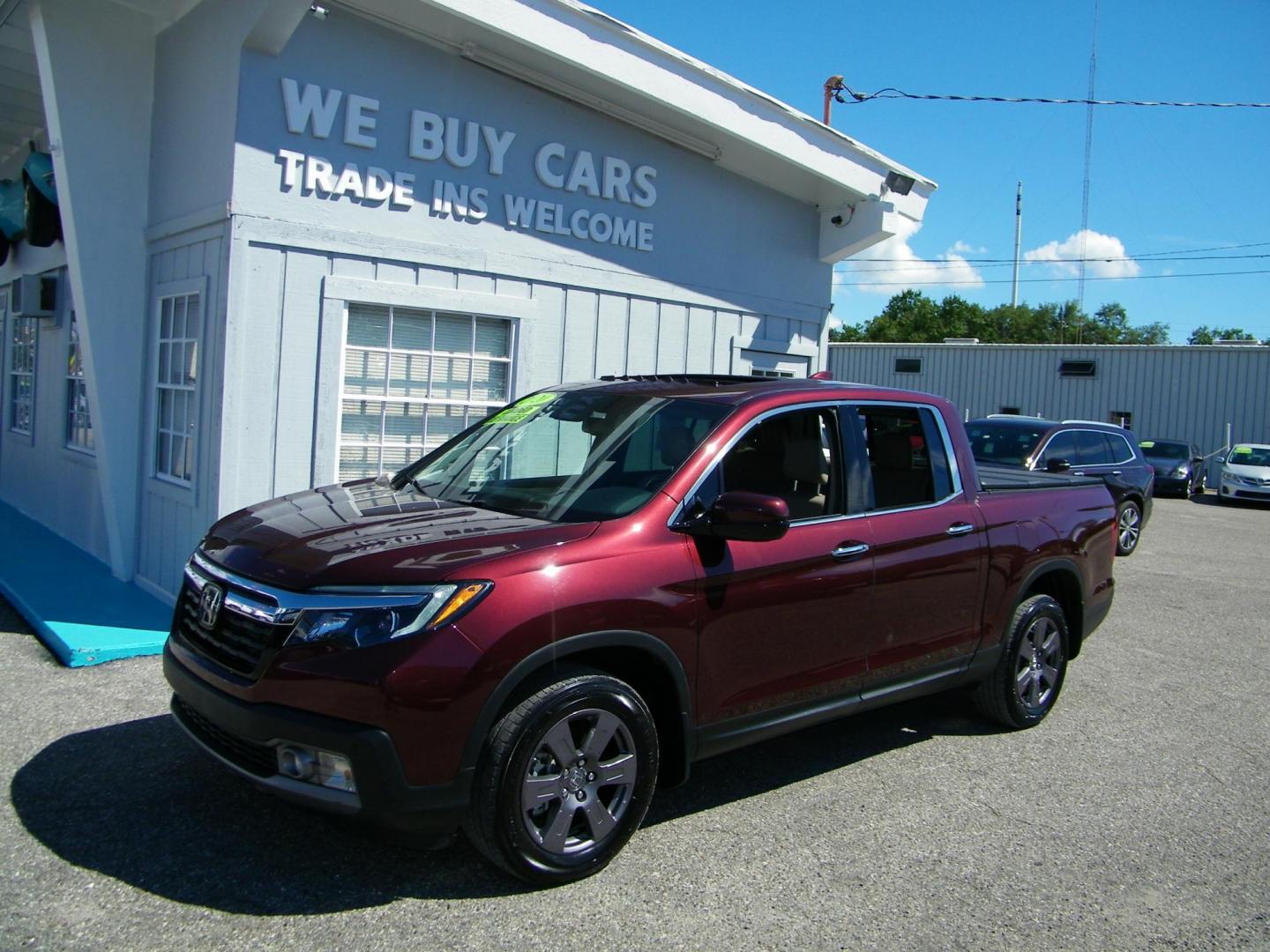 2020 Maroon /Beige Honda Ridgeline RTL-E AWD (5FPYK3F70LB) with an 3.5L V6 SOHC 24V engine, 6A transmission, located at 4000 Bee Ridge Road, Sarasota, FL, 34233, (941) 926-0300, 27.298664, -82.489151 - Photo#3