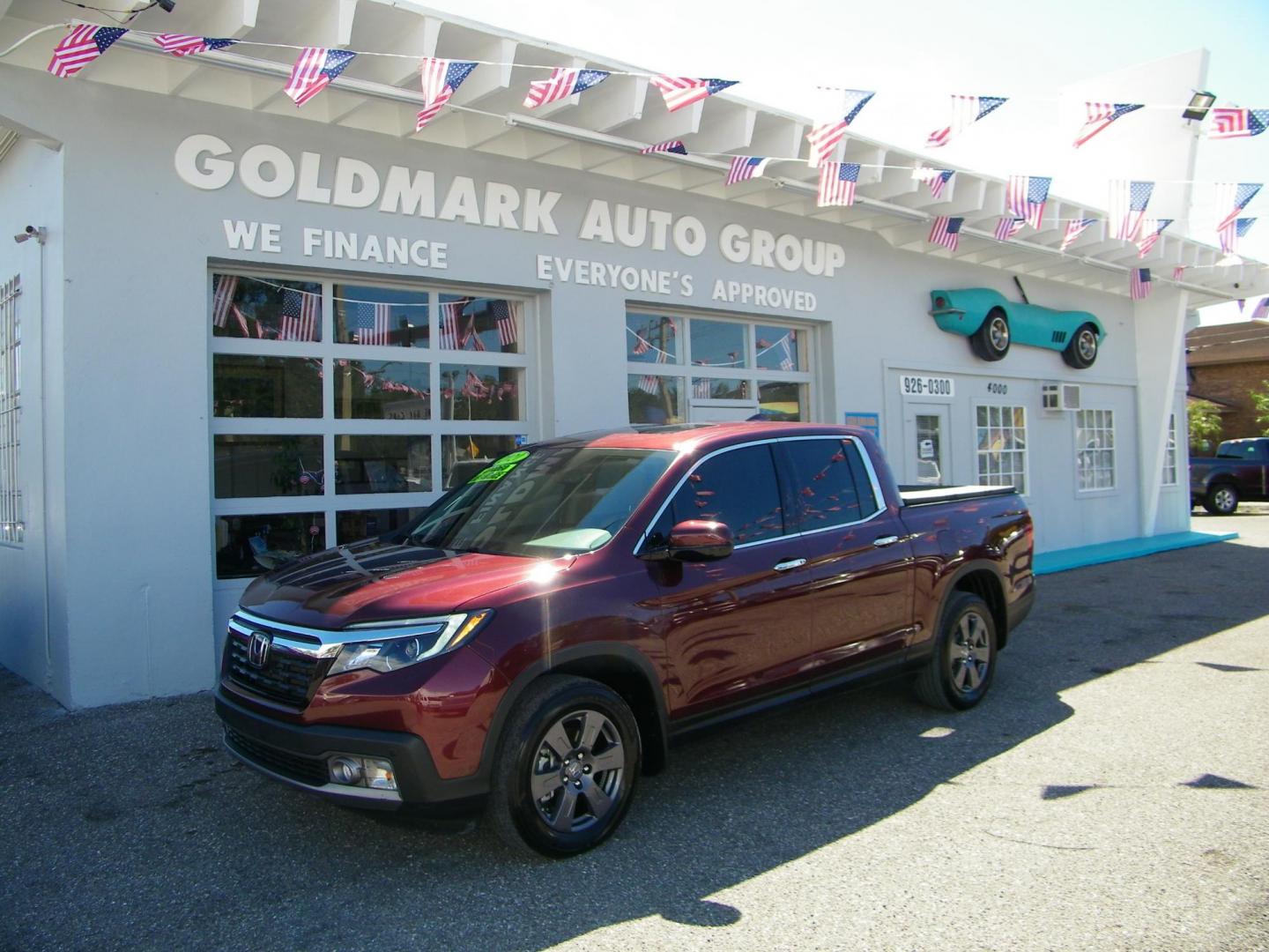 2020 Maroon /Beige Honda Ridgeline RTL-E AWD (5FPYK3F70LB) with an 3.5L V6 SOHC 24V engine, 6A transmission, located at 4000 Bee Ridge Road, Sarasota, FL, 34233, (941) 926-0300, 27.298664, -82.489151 - Photo#0
