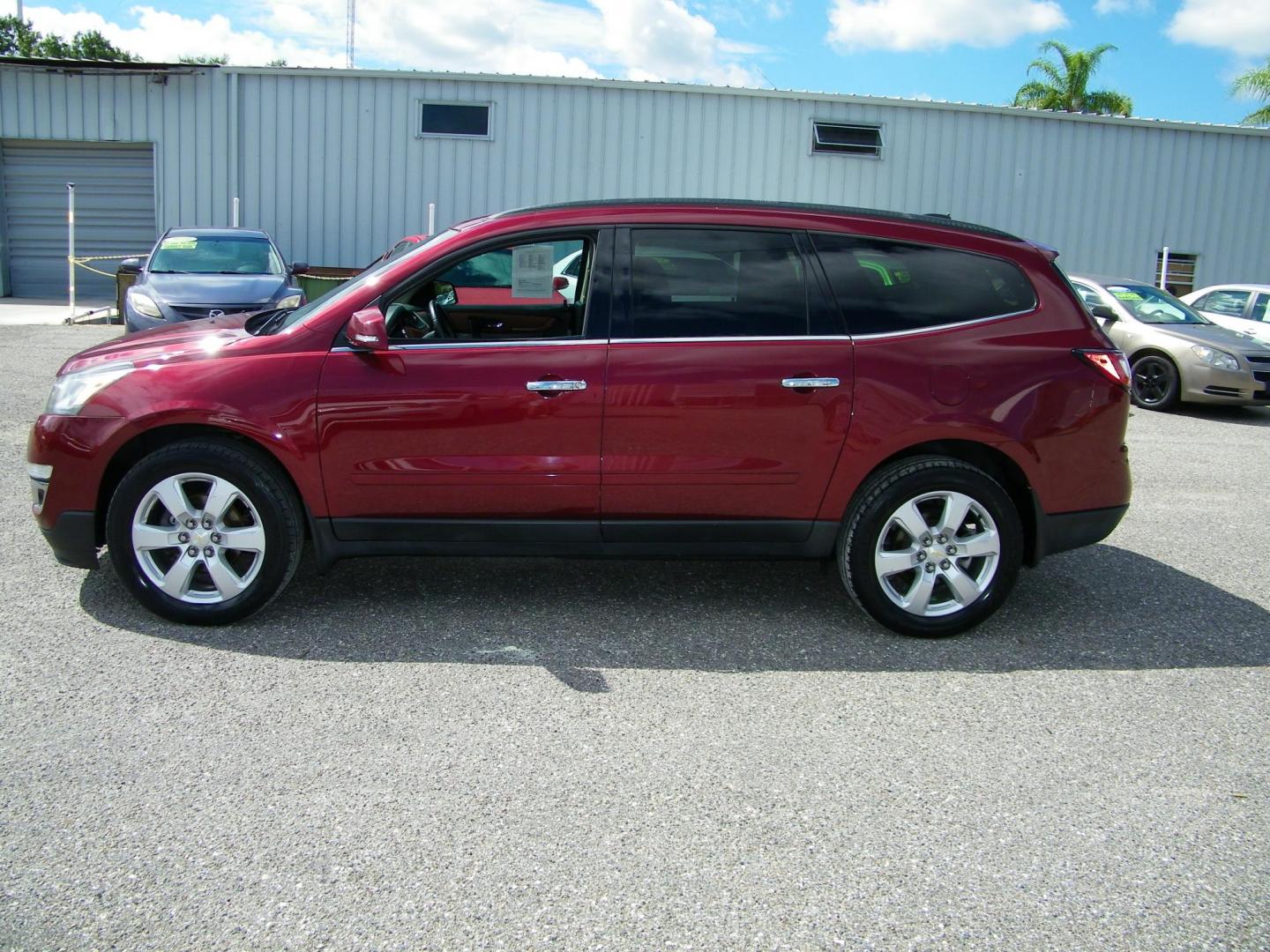 2017 Maroon /Black Chevrolet Traverse 1LT FWD (1GNKRGKD8HJ) with an 3.6L V6 DOHC 24V engine, 6A transmission, located at 4000 Bee Ridge Road, Sarasota, FL, 34233, (941) 926-0300, 27.298664, -82.489151 - Photo#2