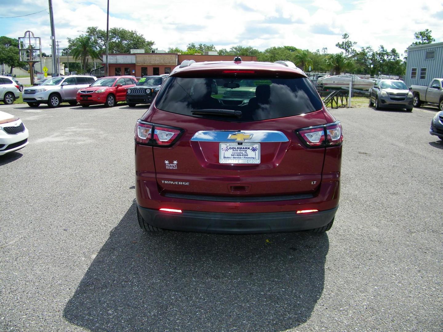2017 Maroon /Black Chevrolet Traverse 1LT FWD (1GNKRGKD8HJ) with an 3.6L V6 DOHC 24V engine, 6A transmission, located at 4000 Bee Ridge Road, Sarasota, FL, 34233, (941) 926-0300, 27.298664, -82.489151 - Photo#4