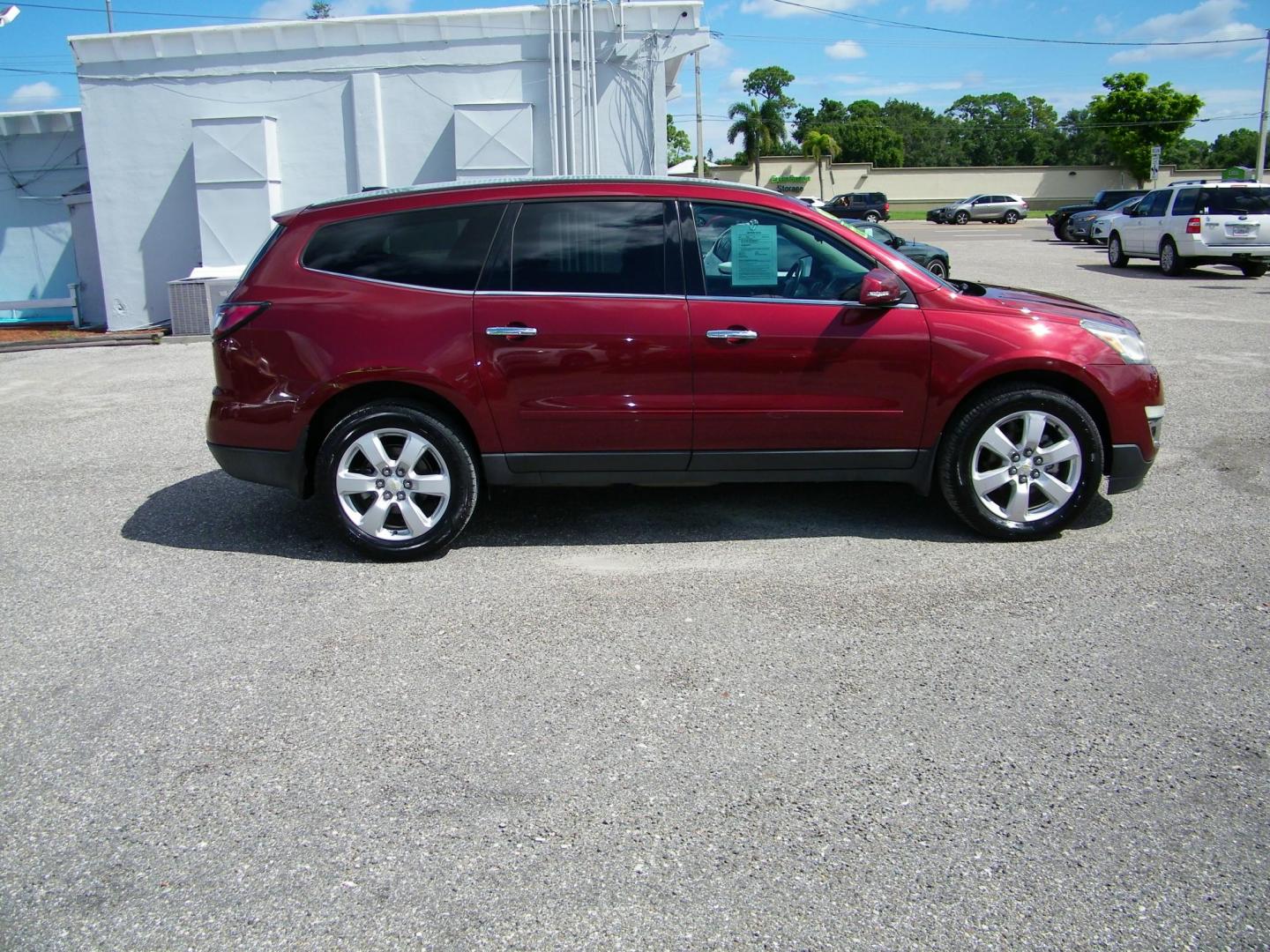 2017 Maroon /Black Chevrolet Traverse 1LT FWD (1GNKRGKD8HJ) with an 3.6L V6 DOHC 24V engine, 6A transmission, located at 4000 Bee Ridge Road, Sarasota, FL, 34233, (941) 926-0300, 27.298664, -82.489151 - Photo#6
