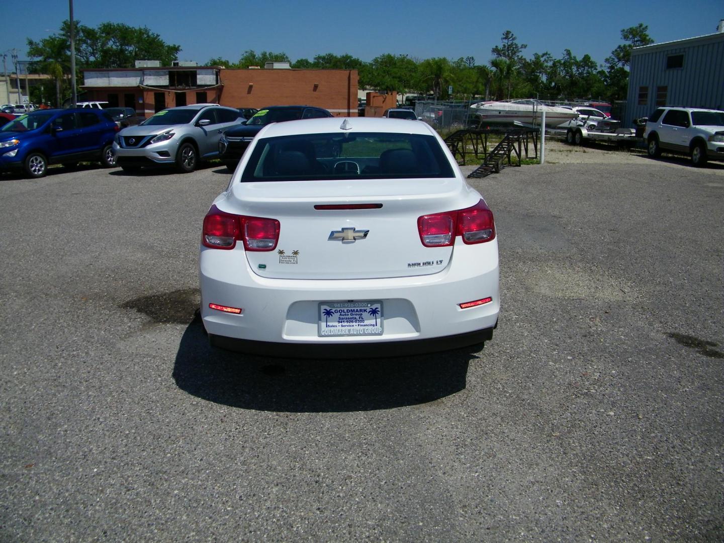 2015 White /Black Chevrolet Malibu 1LT (1G11C5SL7FF) with an 2.5L L4 DOHC 16V engine, 6-Speed Automatic transmission, located at 4000 Bee Ridge Road, Sarasota, FL, 34233, (941) 926-0300, 27.298664, -82.489151 - Photo#3