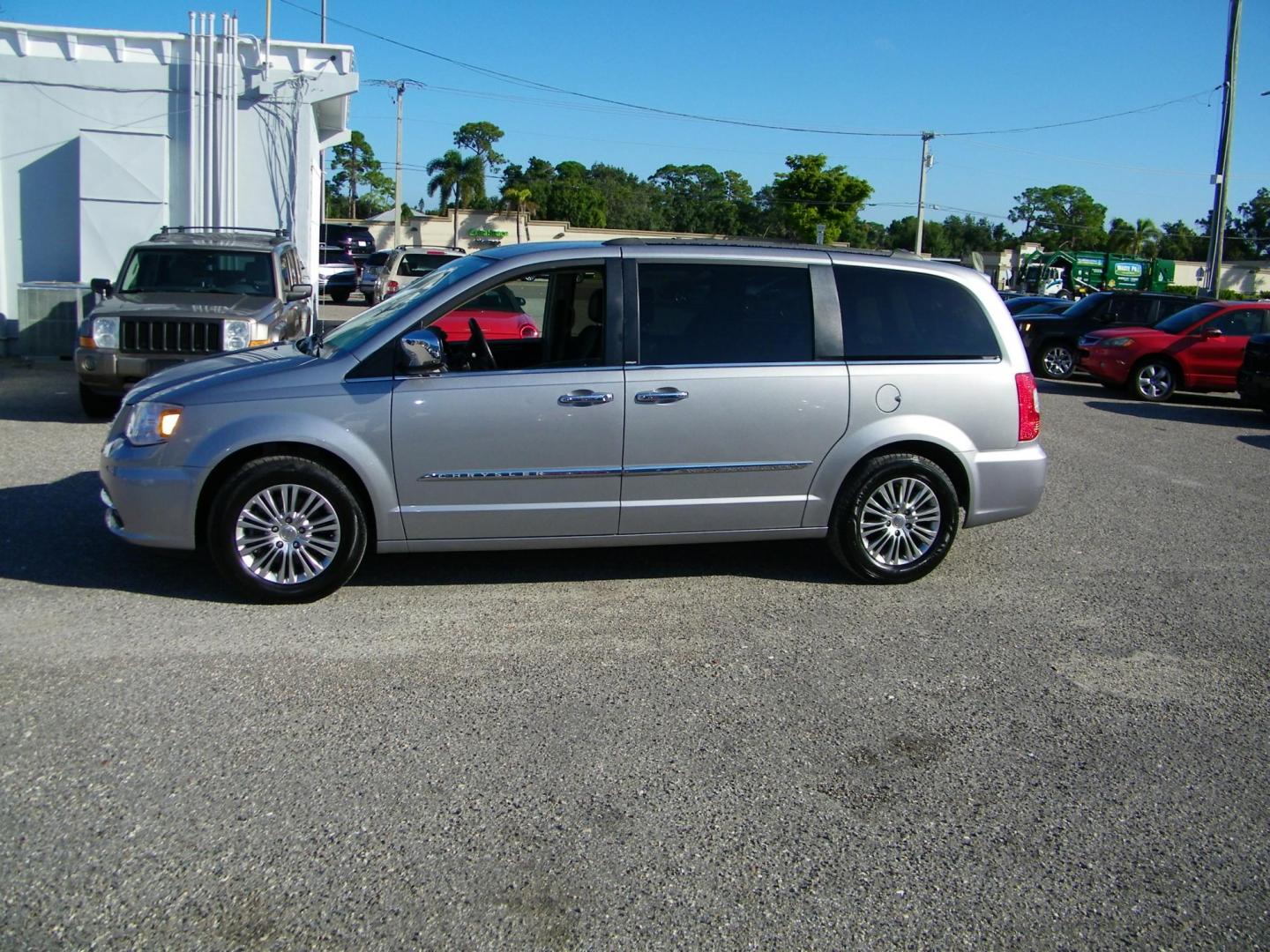 2013 Silver /Grey Chrysler Town & Country Touring-L (2C4RC1CG1DR) with an 3.6L V6 DOHC 24V engine, 6-Speed Automatic transmission, located at 4000 Bee Ridge Road, Sarasota, FL, 34233, (941) 926-0300, 27.298664, -82.489151 - Photo#2