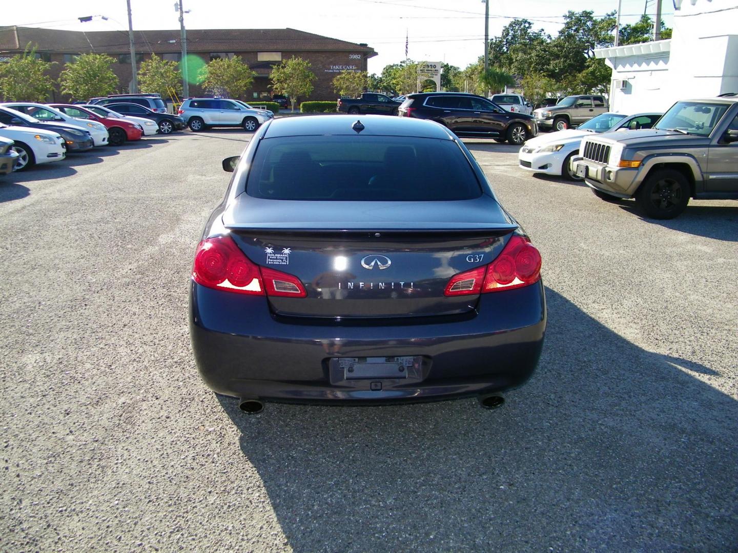 2009 Grey /Grey Infiniti G Sedan G37 (JNKCV61E09M) with an 3.7L V6 DOHC 24V engine, 5-Speed Automatic transmission, located at 4000 Bee Ridge Road, Sarasota, FL, 34233, (941) 926-0300, 27.298664, -82.489151 - Photo#4