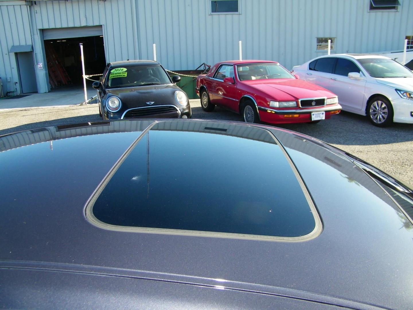 2009 Grey /Grey Infiniti G Sedan G37 (JNKCV61E09M) with an 3.7L V6 DOHC 24V engine, 5-Speed Automatic transmission, located at 4000 Bee Ridge Road, Sarasota, FL, 34233, (941) 926-0300, 27.298664, -82.489151 - Photo#8