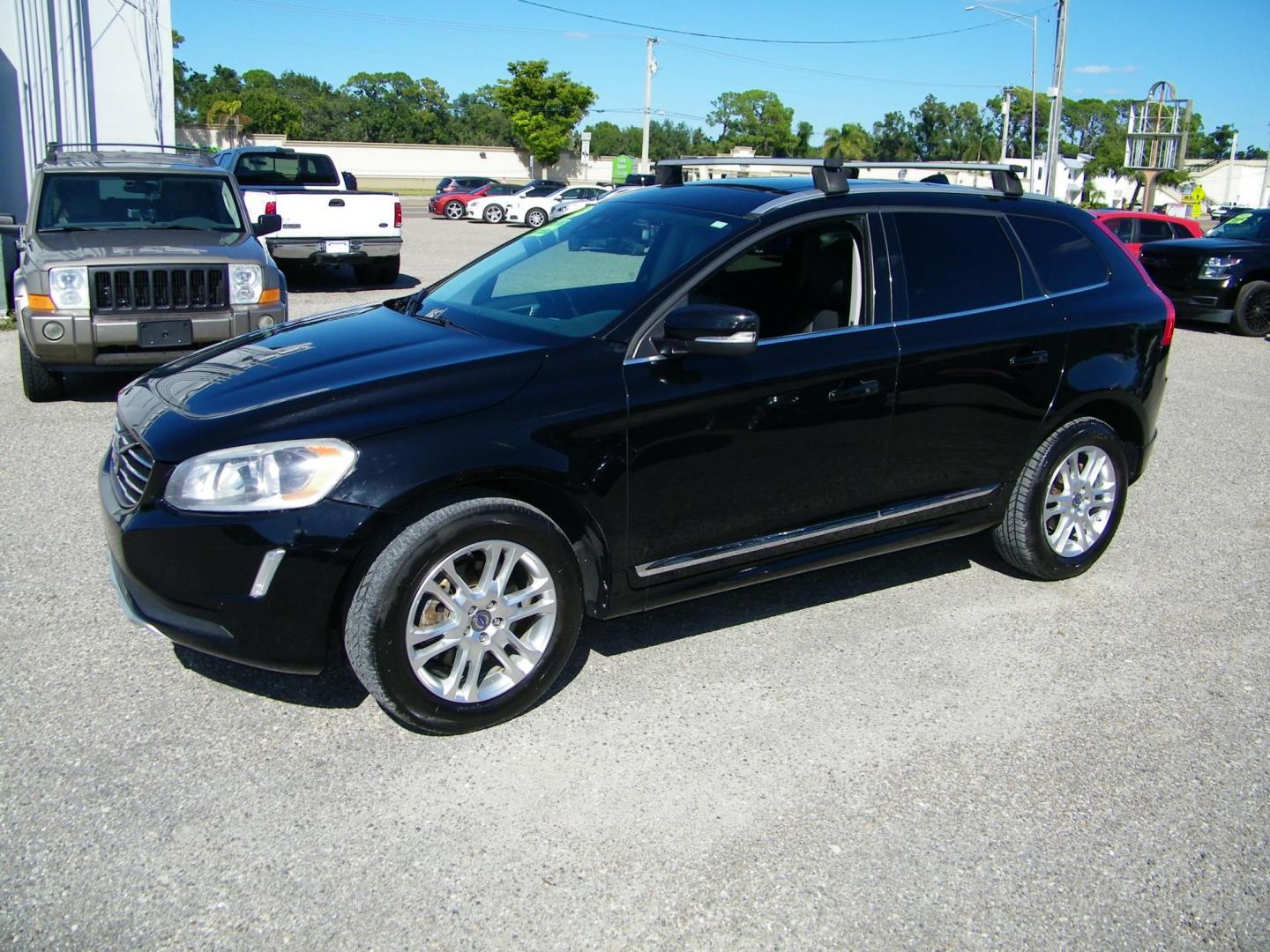 2015 Black /Black Volvo XC60 T6 Drive-E Premier Plus FWD (YV440MDC8F2) with an 2.0L L4 DOHC 16V TURBO engine, 8-Speed Automatic transmission, located at 4000 Bee Ridge Road, Sarasota, FL, 34233, (941) 926-0300, 27.298664, -82.489151 - Photo#0