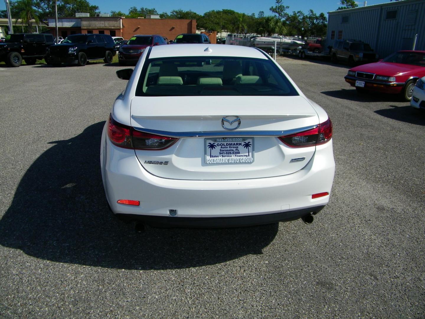 2014 WHITE /Tan Mazda Mazda6 i Grand Touring (JM1GJ1W69E1) with an 2.5L L4 DOHC 16V engine, 6-Speed Automatic transmission, located at 4000 Bee Ridge Road, Sarasota, FL, 34233, (941) 926-0300, 27.298664, -82.489151 - Photo#4