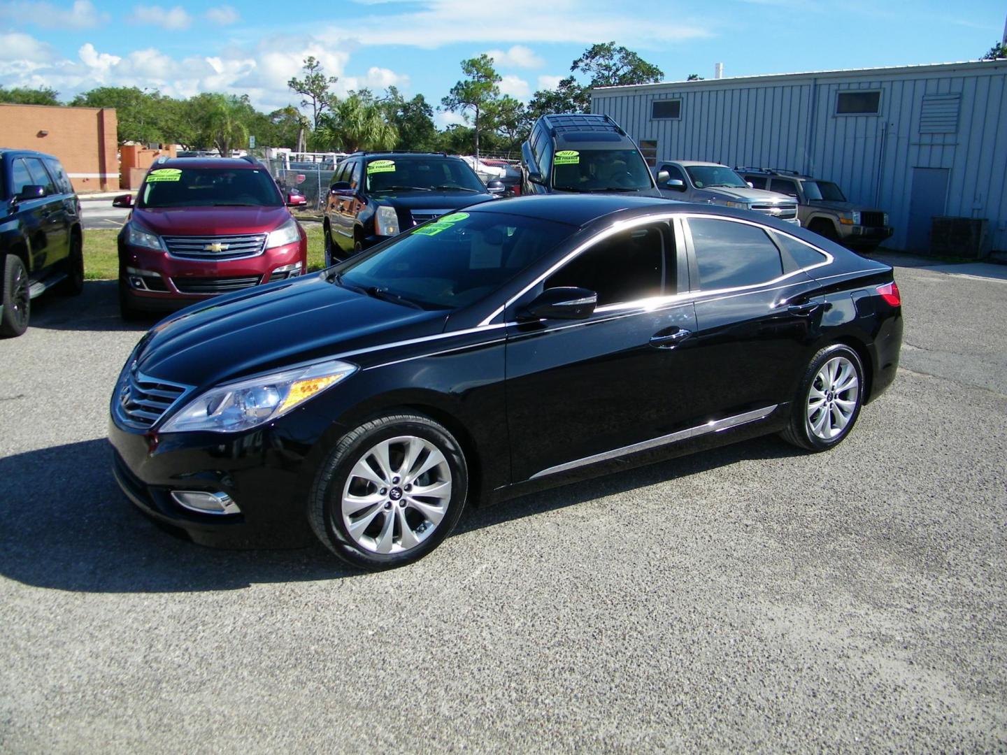 2014 Black /Black Hyundai Azera Limited (KMHFH4JG7EA) with an 3.3L V6 DOHC 24V engine, 6-Speed Automatic transmission, located at 4000 Bee Ridge Road, Sarasota, FL, 34233, (941) 926-0300, 27.298664, -82.489151 - Photo#0