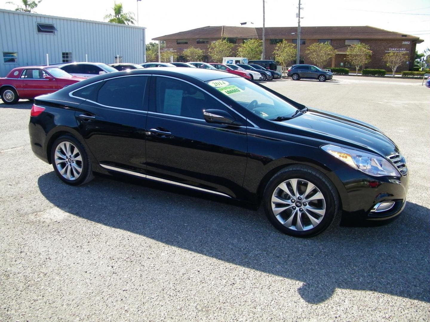 2014 Black /Black Hyundai Azera Limited (KMHFH4JG7EA) with an 3.3L V6 DOHC 24V engine, 6-Speed Automatic transmission, located at 4000 Bee Ridge Road, Sarasota, FL, 34233, (941) 926-0300, 27.298664, -82.489151 - Photo#7