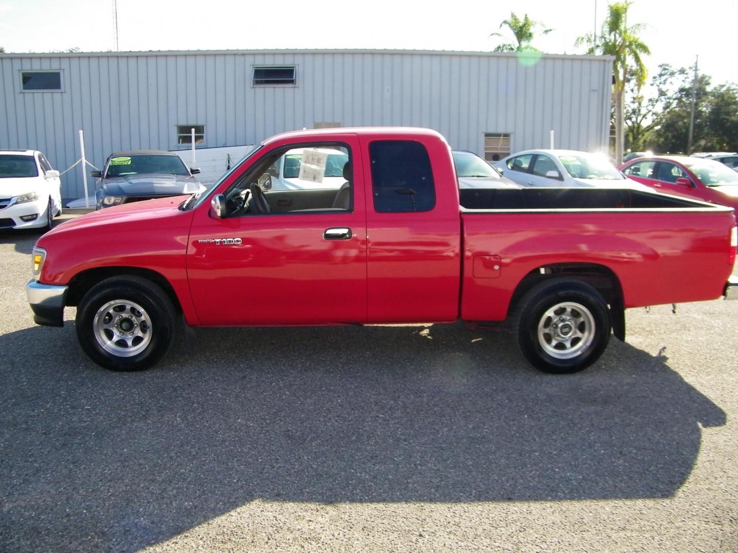 1998 Red /Beige Toyota T100 DX Xtracab 2WD (JT4TN12D6W0) with an 3.4L V6 DOHC 24V engine, Automatic transmission, located at 4000 Bee Ridge Road, Sarasota, FL, 34233, (941) 926-0300, 27.298664, -82.489151 - Photo#2
