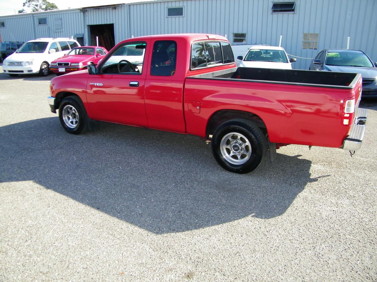 1998 Red /Beige Toyota T100 DX Xtracab 2WD (JT4TN12D6W0) with an 3.4L V6 DOHC 24V engine, Automatic transmission, located at 4000 Bee Ridge Road, Sarasota, FL, 34233, (941) 926-0300, 27.298664, -82.489151 - Photo#3