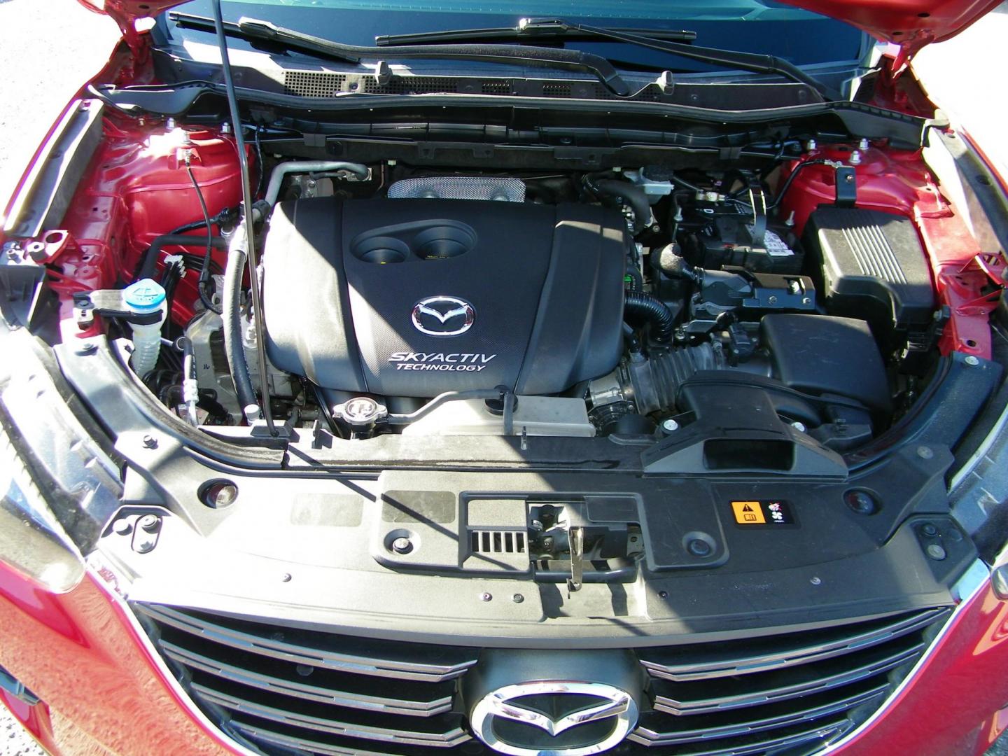 2016 Red /Beige Mazda CX-5 Touring (JM3KE2CY0G0) with an 2.5L L4 DOHC 16V engine, 6-Speed Automatic transmission, located at 4000 Bee Ridge Road, Sarasota, FL, 34233, (941) 926-0300, 27.298664, -82.489151 - Photo#9