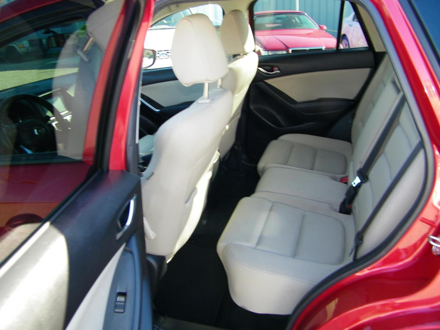 2016 Red /Beige Mazda CX-5 Touring (JM3KE2CY0G0) with an 2.5L L4 DOHC 16V engine, 6-Speed Automatic transmission, located at 4000 Bee Ridge Road, Sarasota, FL, 34233, (941) 926-0300, 27.298664, -82.489151 - Photo#10