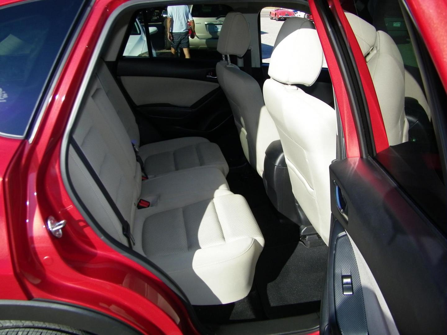 2016 Red /Beige Mazda CX-5 Touring (JM3KE2CY0G0) with an 2.5L L4 DOHC 16V engine, 6-Speed Automatic transmission, located at 4000 Bee Ridge Road, Sarasota, FL, 34233, (941) 926-0300, 27.298664, -82.489151 - Photo#12