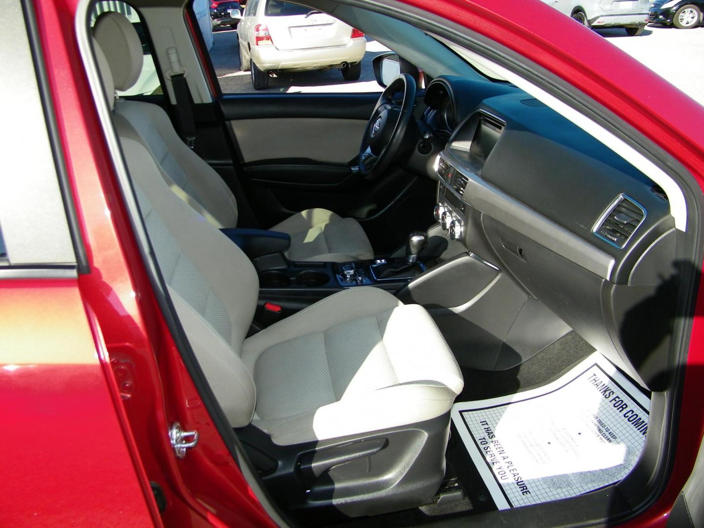 2016 Red /Beige Mazda CX-5 Touring (JM3KE2CY0G0) with an 2.5L L4 DOHC 16V engine, 6-Speed Automatic transmission, located at 4000 Bee Ridge Road, Sarasota, FL, 34233, (941) 926-0300, 27.298664, -82.489151 - Photo#14