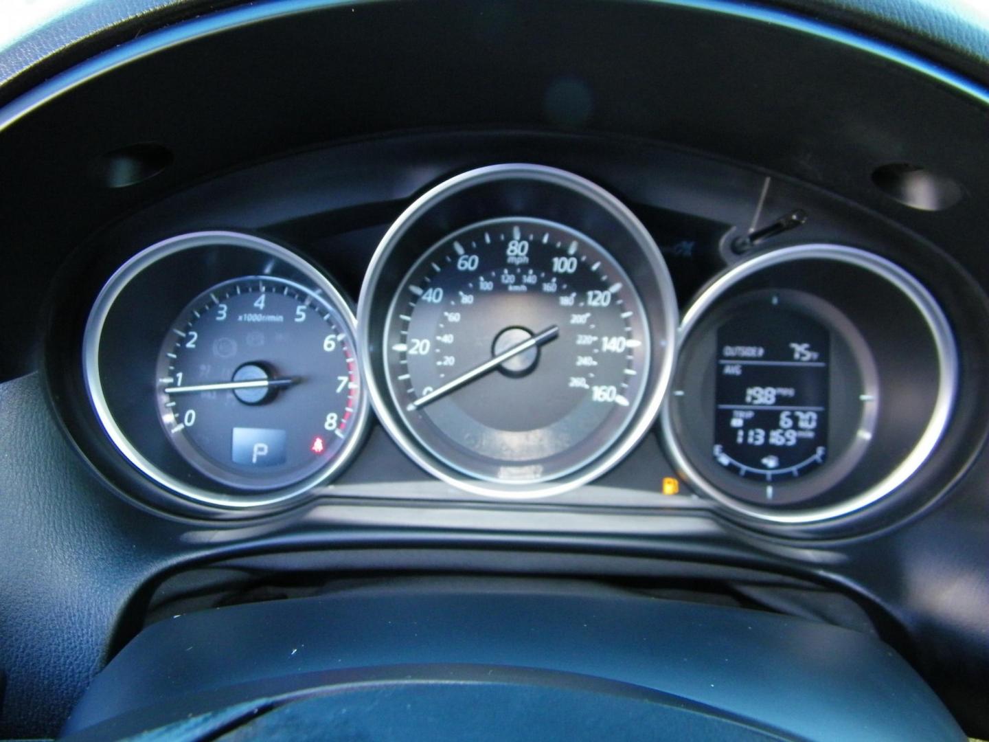 2016 Red /Beige Mazda CX-5 Touring (JM3KE2CY0G0) with an 2.5L L4 DOHC 16V engine, 6-Speed Automatic transmission, located at 4000 Bee Ridge Road, Sarasota, FL, 34233, (941) 926-0300, 27.298664, -82.489151 - Photo#28