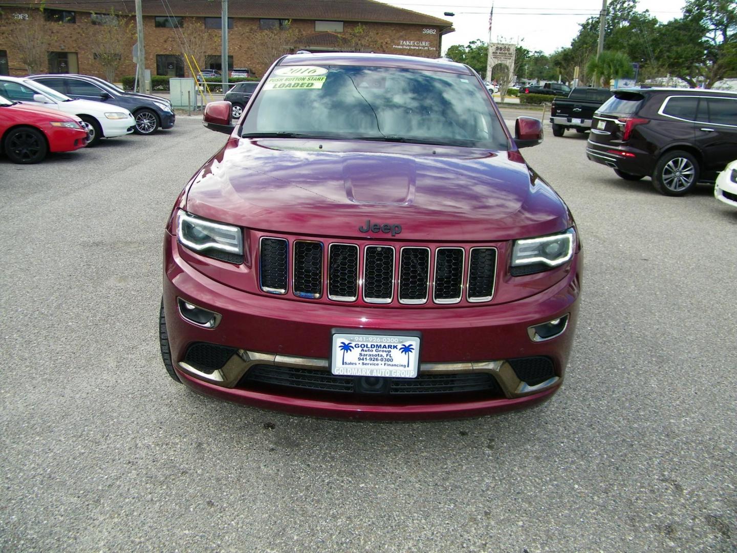 2016 Red /Black Jeep Grand Cherokee Overland 4WD (1C4RJFCG8GC) with an 3.6L V6 DOHC 24V engine, 8A transmission, located at 4000 Bee Ridge Road, Sarasota, FL, 34233, (941) 926-0300, 27.298664, -82.489151 - Photo#1