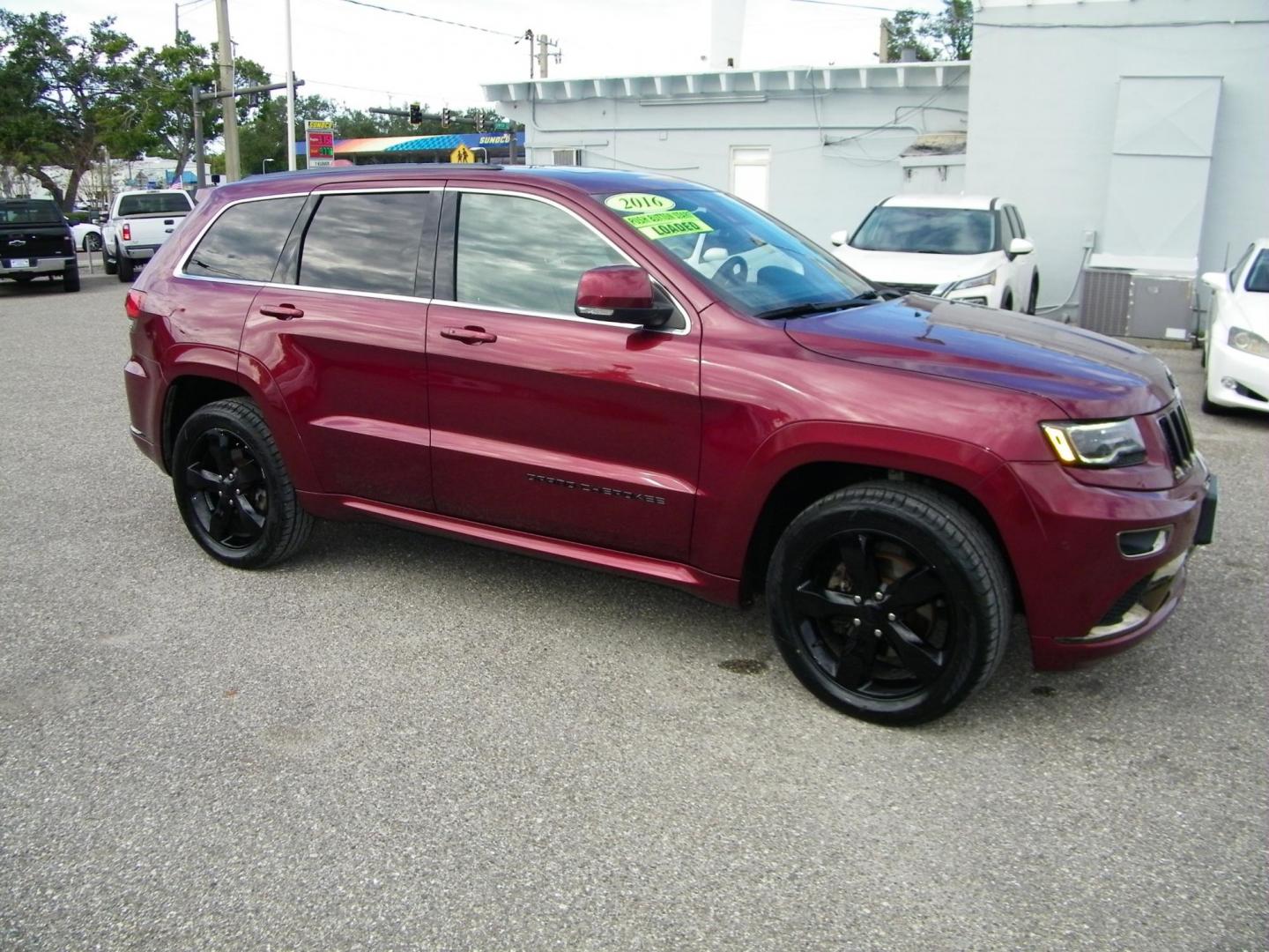 2016 Red /Black Jeep Grand Cherokee Overland 4WD (1C4RJFCG8GC) with an 3.6L V6 DOHC 24V engine, 8A transmission, located at 4000 Bee Ridge Road, Sarasota, FL, 34233, (941) 926-0300, 27.298664, -82.489151 - Photo#7