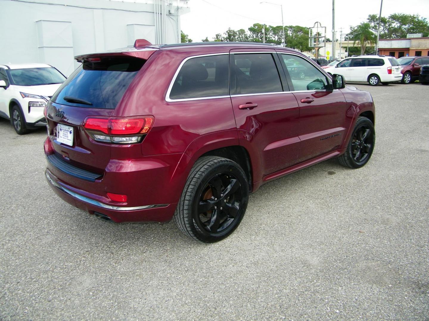 2016 Red /Black Jeep Grand Cherokee Overland 4WD (1C4RJFCG8GC) with an 3.6L V6 DOHC 24V engine, 8A transmission, located at 4000 Bee Ridge Road, Sarasota, FL, 34233, (941) 926-0300, 27.298664, -82.489151 - Photo#5