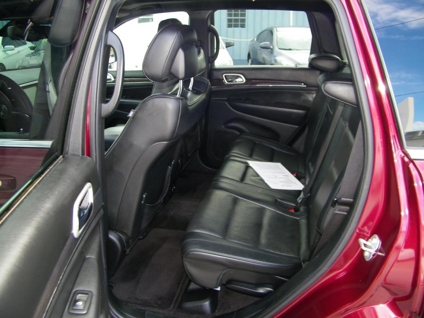 2016 Red /Black Jeep Grand Cherokee Overland 4WD (1C4RJFCG8GC) with an 3.6L V6 DOHC 24V engine, 8A transmission, located at 4000 Bee Ridge Road, Sarasota, FL, 34233, (941) 926-0300, 27.298664, -82.489151 - Photo#10