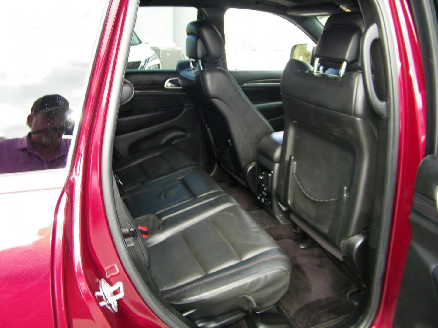 2016 Red /Black Jeep Grand Cherokee Overland 4WD (1C4RJFCG8GC) with an 3.6L V6 DOHC 24V engine, 8A transmission, located at 4000 Bee Ridge Road, Sarasota, FL, 34233, (941) 926-0300, 27.298664, -82.489151 - Photo#16